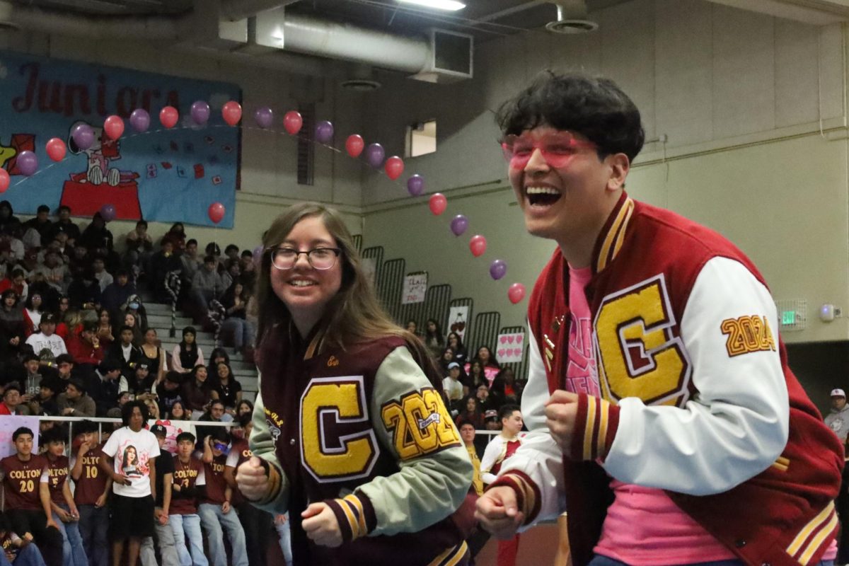Drum majors Erin Dallatorre and Isaac Ornelas lead the band with more than just their musical acumen. Their infectious joy gets the most out of their team.