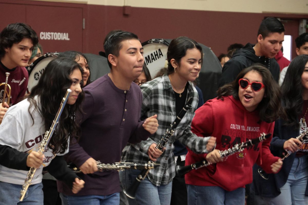 Band finds their groove during their pep rally performance.