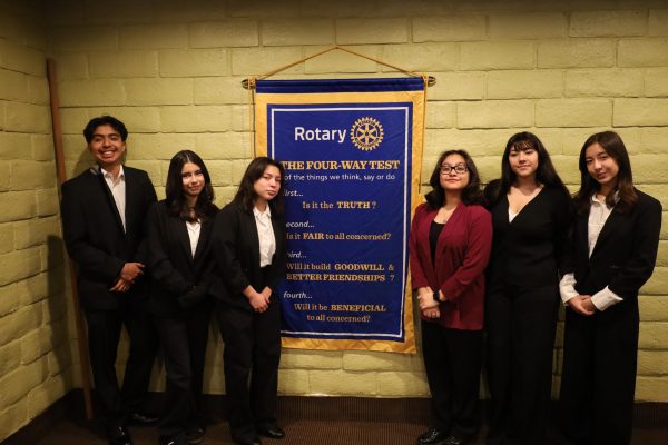All the participants of the speech competition pose for a photo together next to the Rotary Clubs banner, detailing the 4-Way Test. From left to right: Andrew Diaz, Hailey Munoz, Diana Ruvalcaba, Sienna Fernandez , Nicole Valadez, and Genesis Rodela. 
