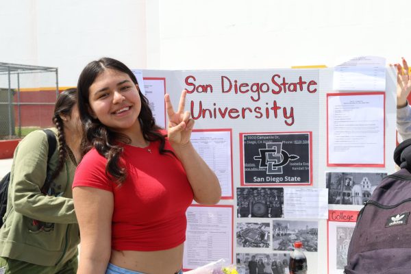 AVID Sophomore Kendall Smith shows off her presentation about San Diego State University at the annual College Fair.