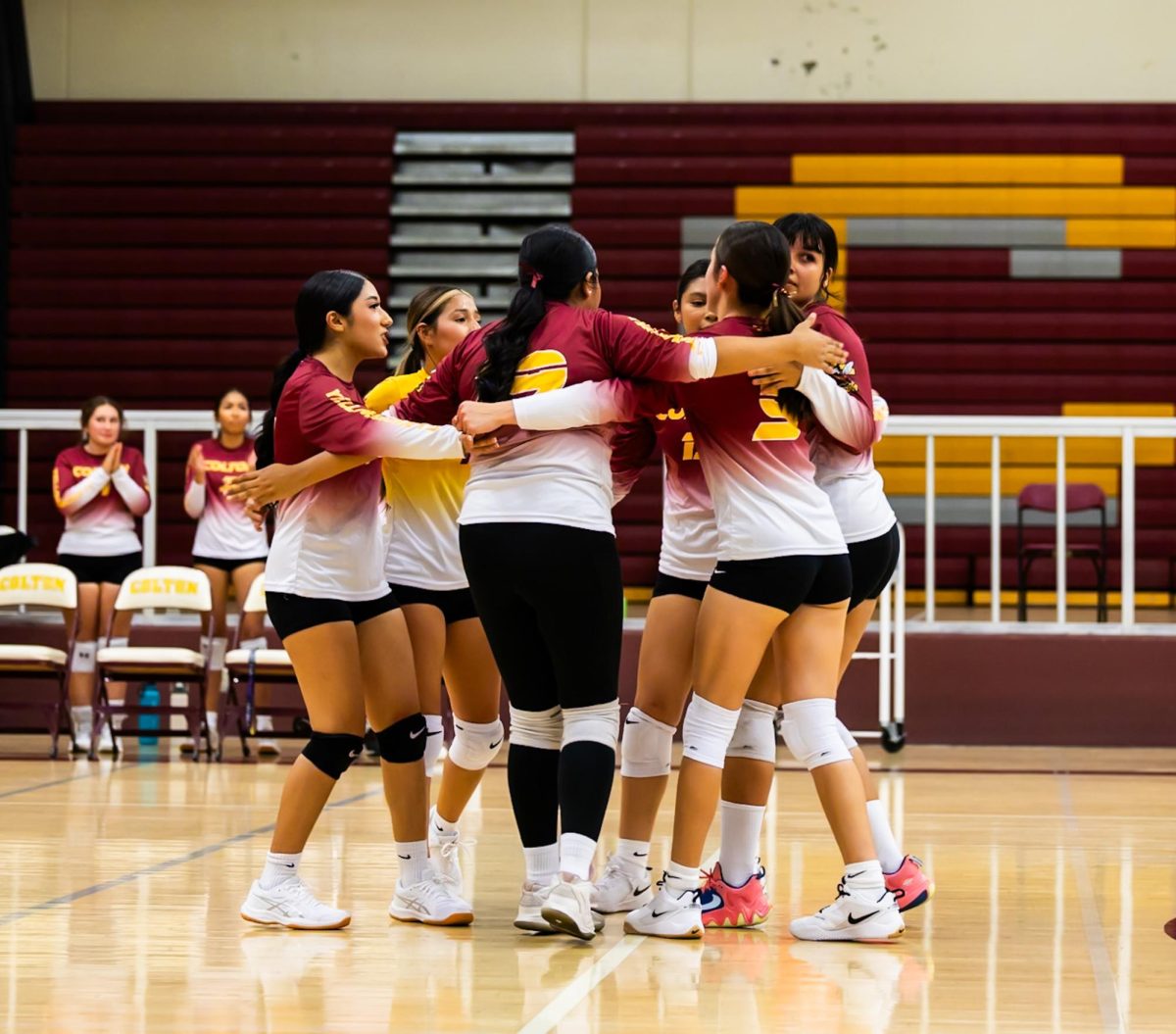 The Yellowjacket volleyball team shows their team unity in their first game against Citrus Hill. The Yellowjackets defeated the Hawks 3 sets to 0 in the first match of the season.