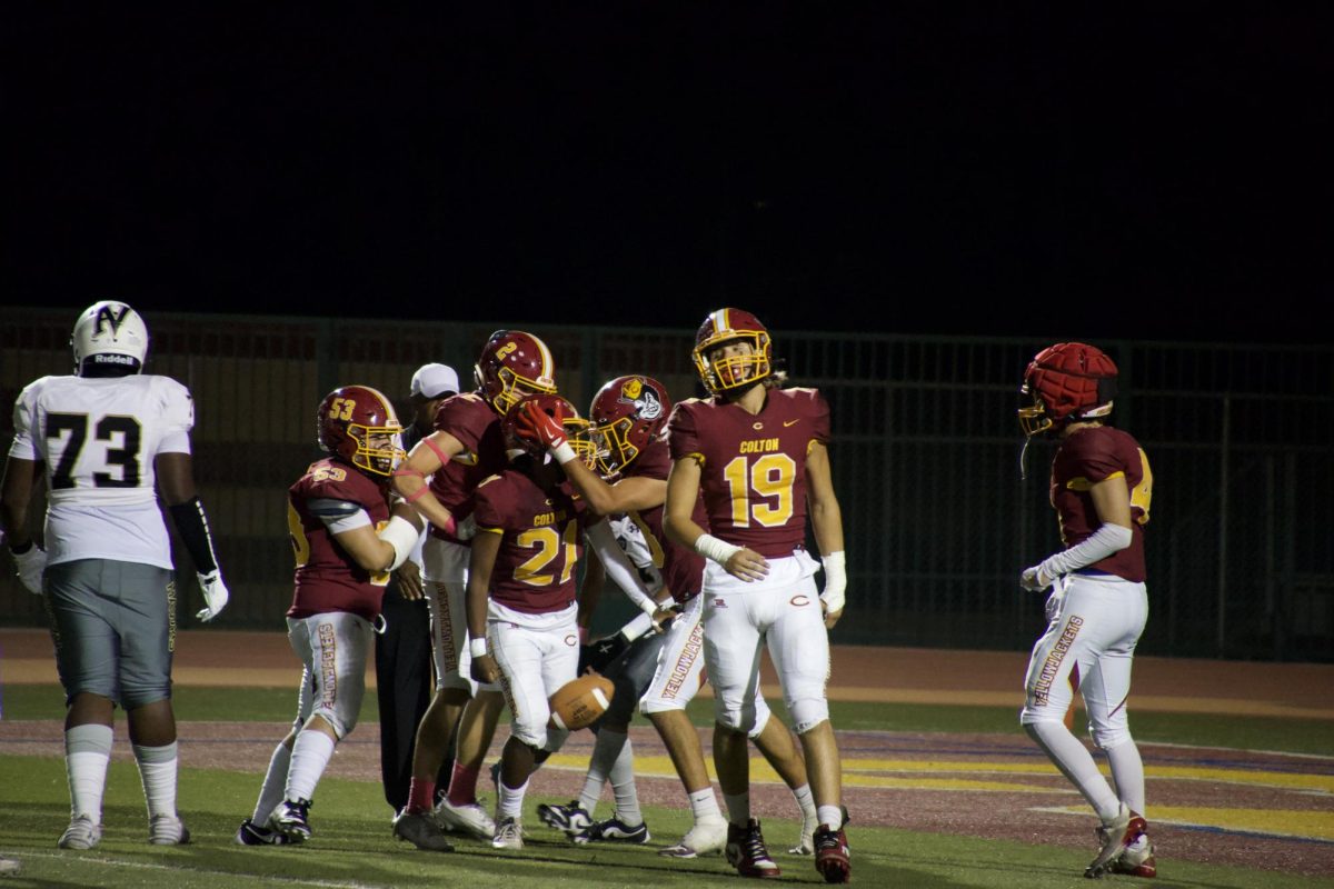 The boys hype of Troy Pouvi after making big plays and catches. 