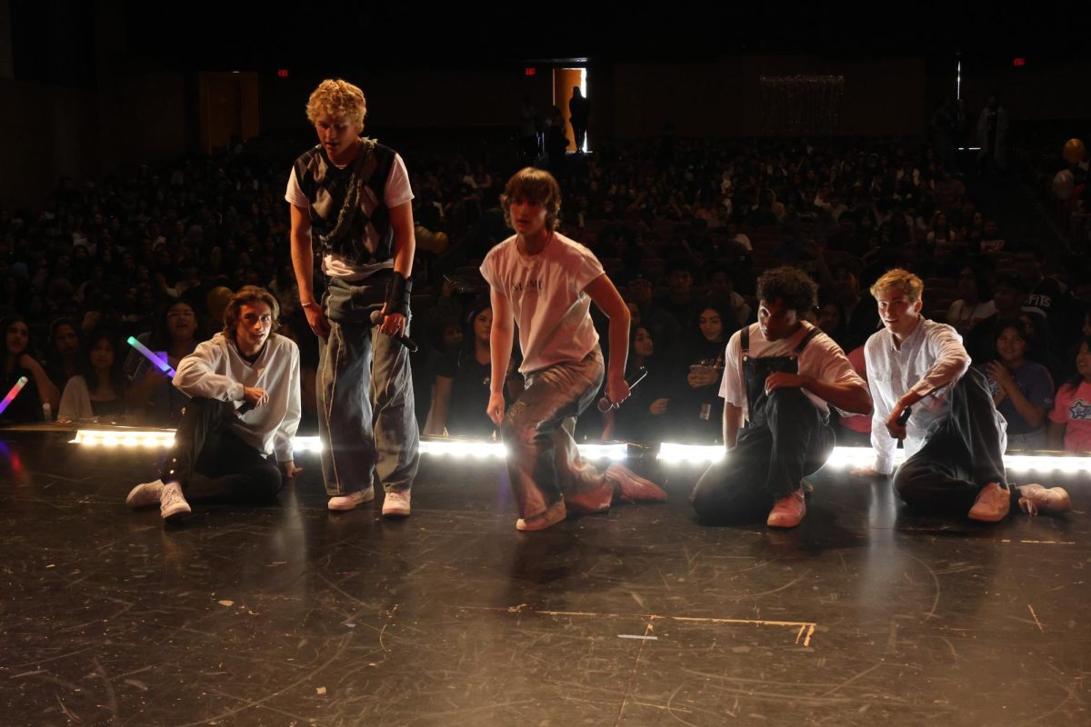 The Full Circle Boys pose together after their performance at the PBIS assembly