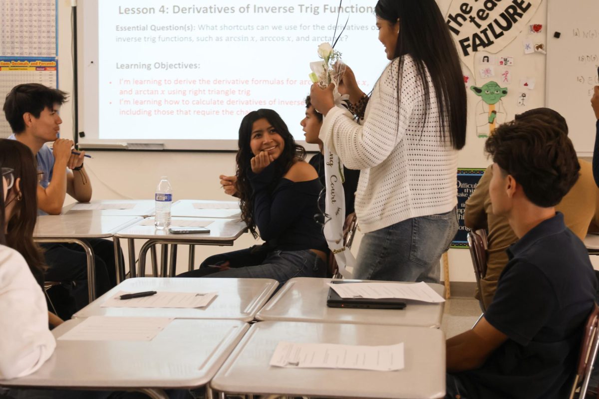 Alexa Munoz is surprised by ASB leader Kiara Verdin during second period on Oct. 3. She was one of 11 seniors named to the 2024 Homecoming Court.