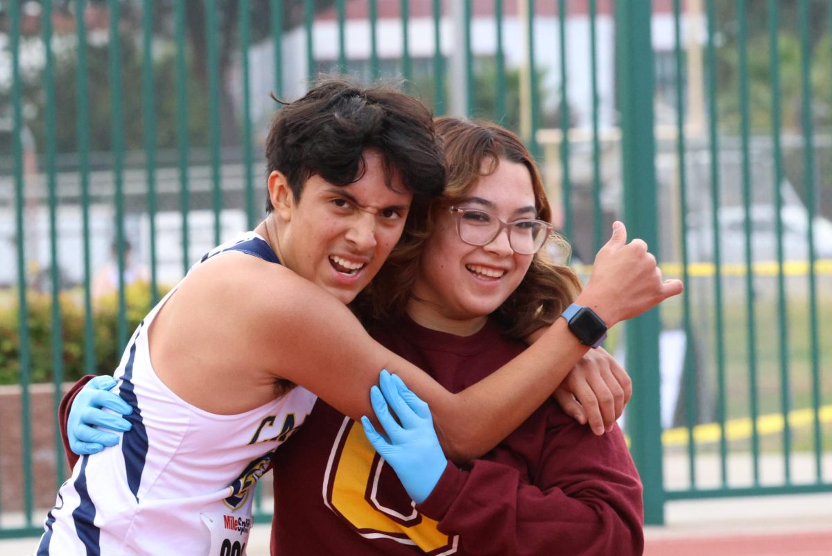 Sometimes the runners need a little extra help after giving everything they have for the three miles.