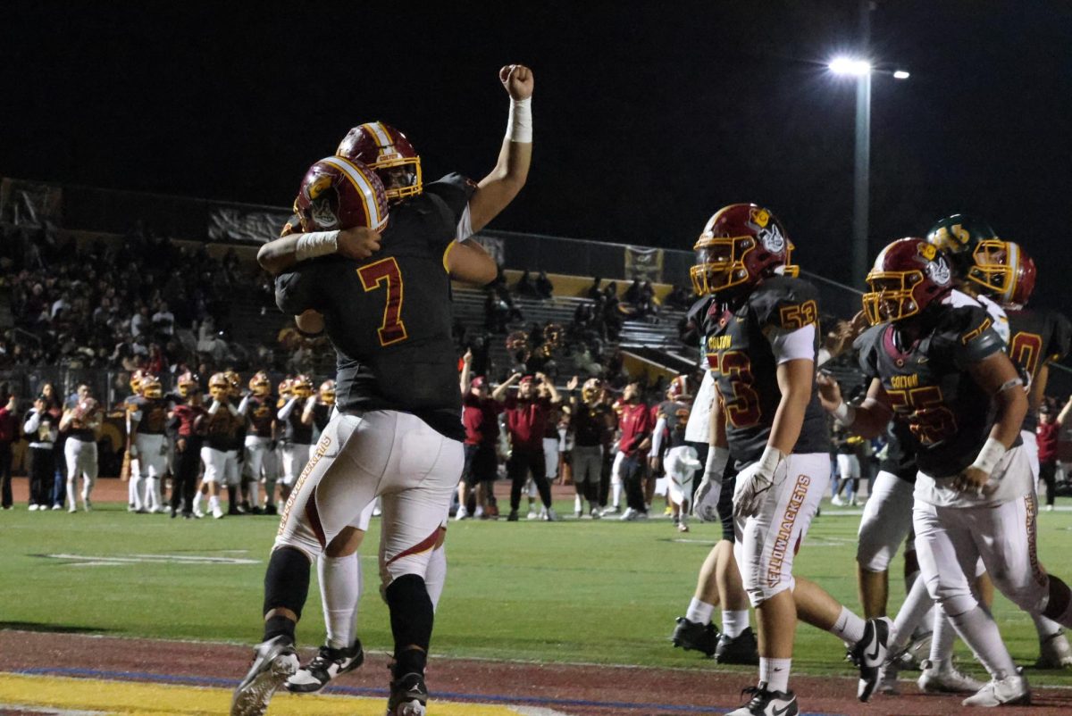 The Yellowjackets celebrate their first league title since 2009 as they rout Notre Dame 62-6.