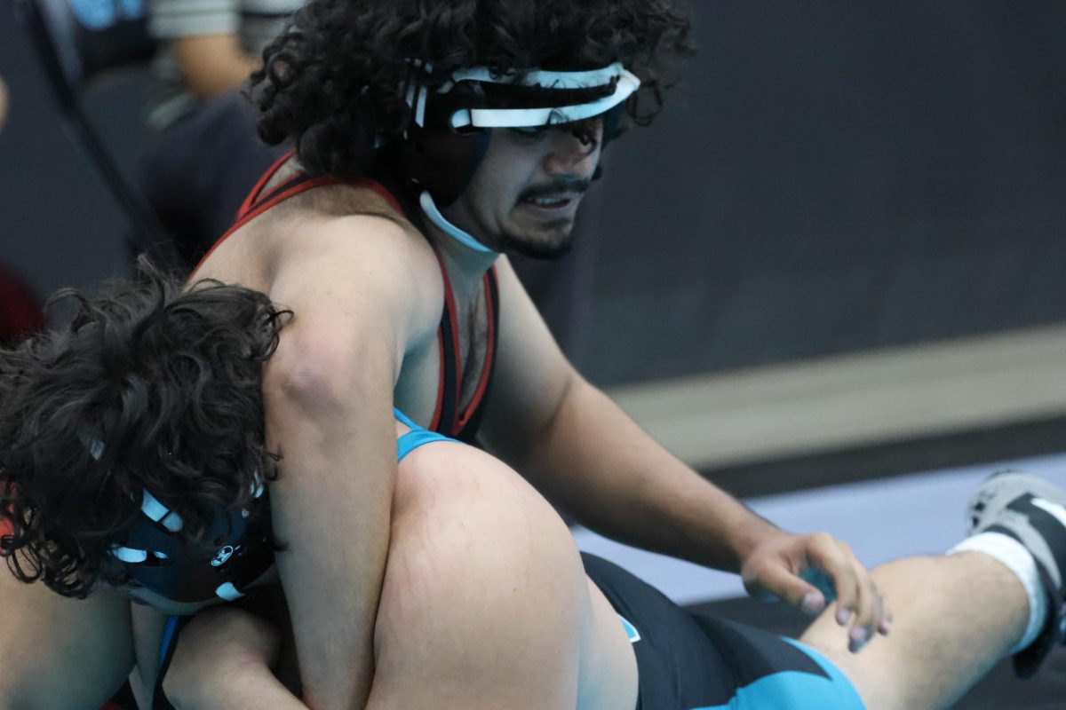 For a little while, it looked like Elio Diaz had met his match, but he came alive midway through the second round and won his match in a 14-9 decision.