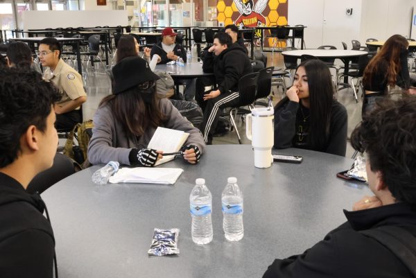 Lexie Ayala (center left) leads a group discussion during January's Student Forum event.