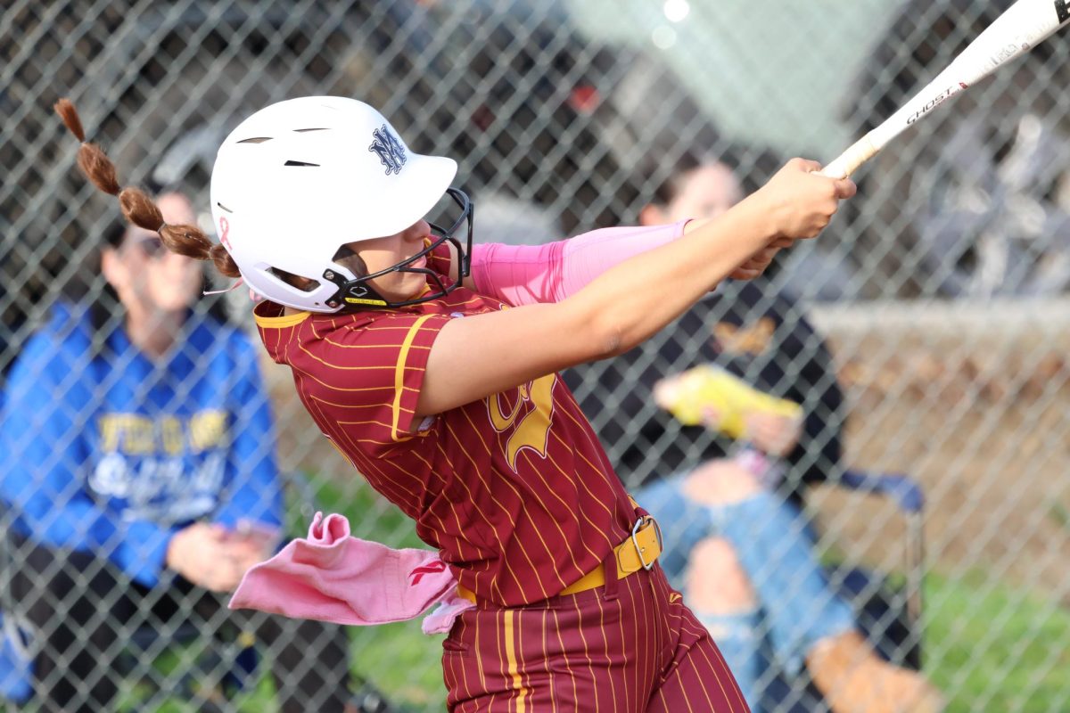 Andrea Varela hits a huge home run to get the Yellowjacket offense started in the second inning of their 13-6 victory over Moreno Valley.