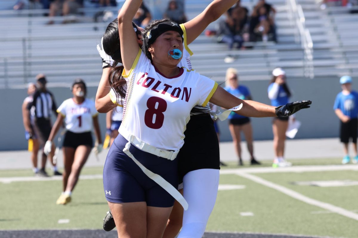 Playing both sides of the ball, Heidi Alarcon gets under the Alta Loma receiver to break up a reception.