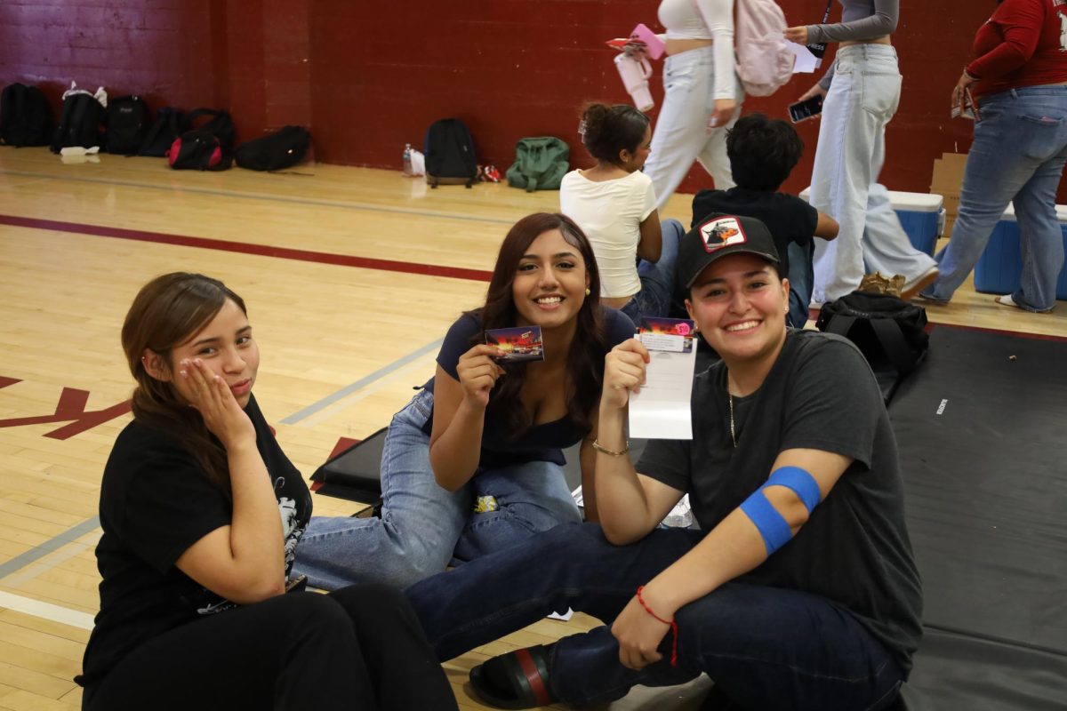 Briana Vasquez, Melanie Saucedo and Lesly Delgadillo show off their In-N-Out gift cards received for donating blood.