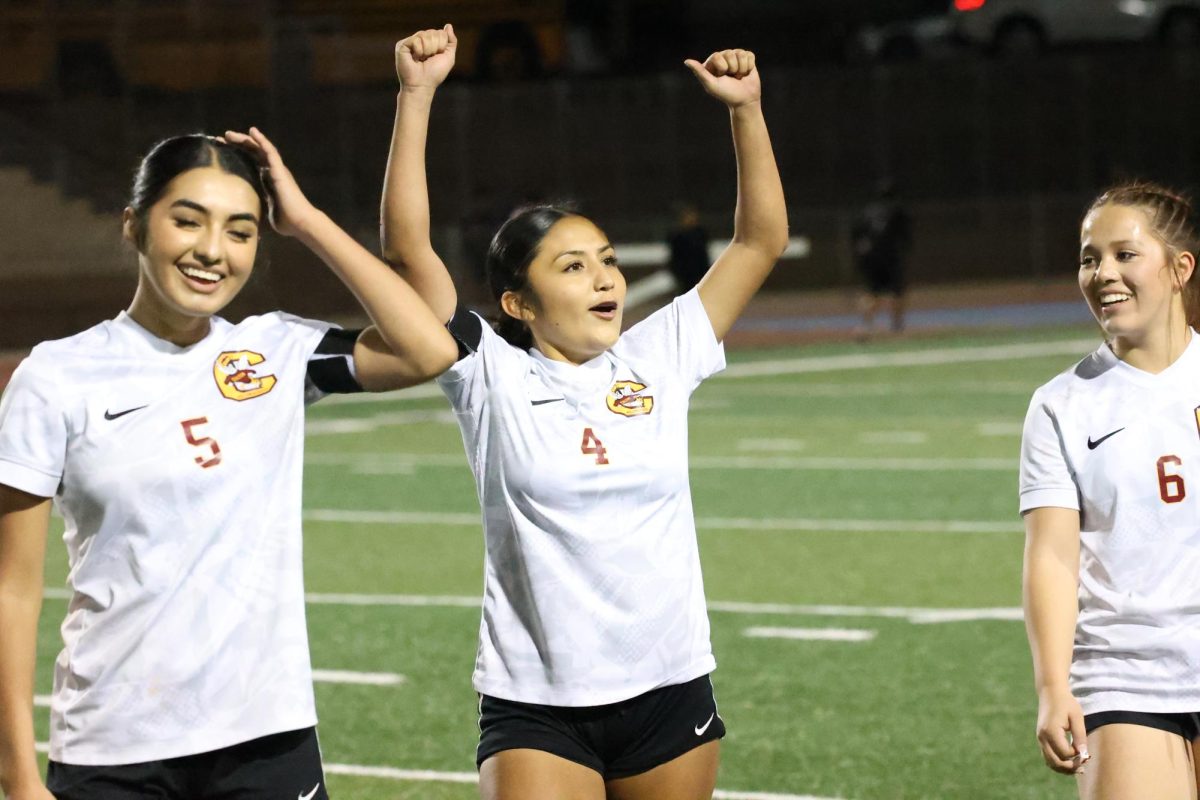 Victory is sweet for Bianca Soto and her teammates Jade Movassaghi and Adalyn Cortez as they celebrate in front of fans after defeating Grand Terrace 2-1 on Jan. 13.