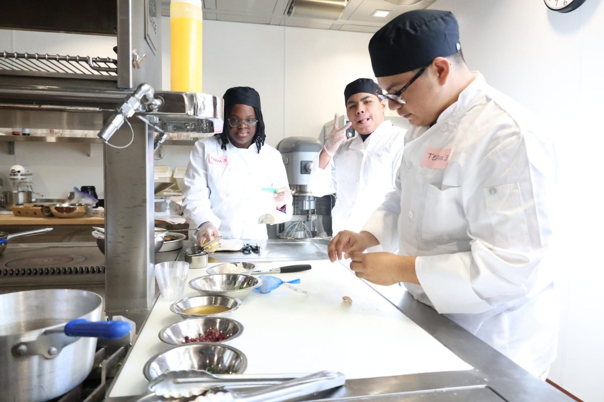 Preparation is key for cooking a successful meal. The culinary crew gets their ingredients in order.