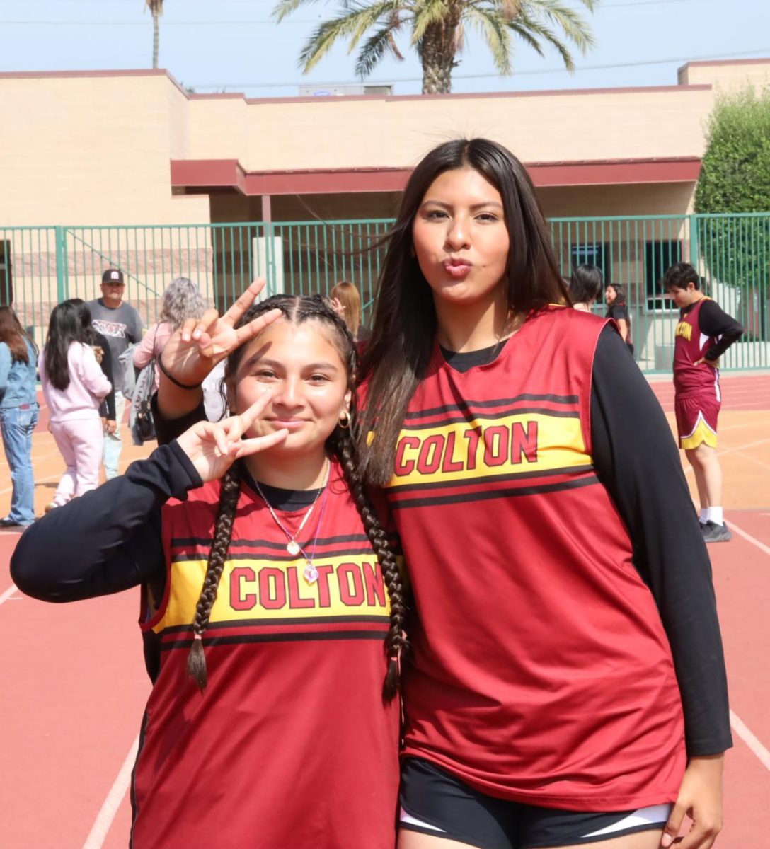 Back in Freshman year, Mia Guerrero and her friend Kelsey Guerrero enjoy a moment between events at the Notre Dame track meet in April 2025.