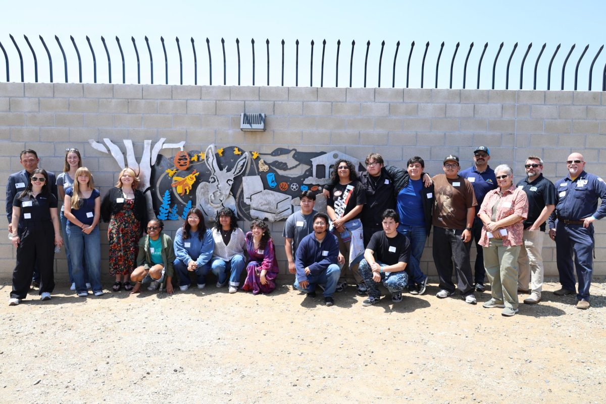 The combination of students in Colton High's Welding Pathway and Grand Terrace High's A.R.T.S. Academy celebrate their successful sculpture collaboration.